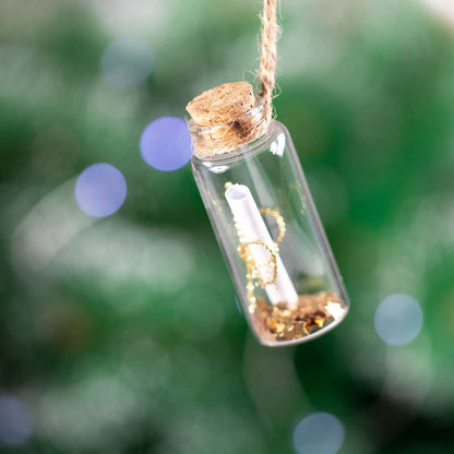 Botecito de cristal para deseos navideños con pergamino y lacito